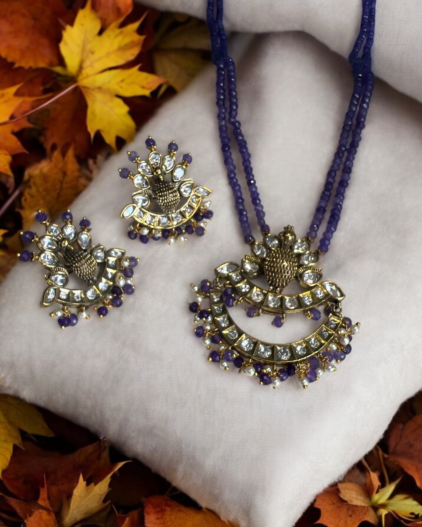 Purple beaded peacock set